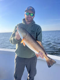 Hunter’s first fish on a poppin’ cork