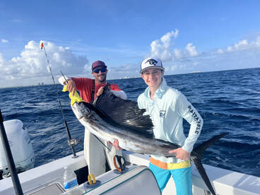 Sailfish, Mahis and a big shark.