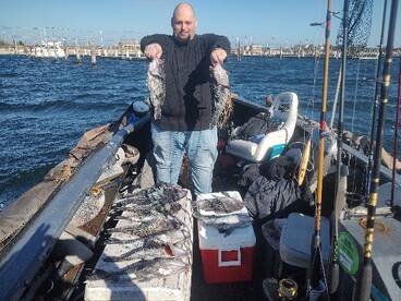 Roberto with our limit of nice sea bass