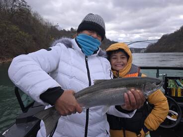 Brown trout and steelhead in big wind.