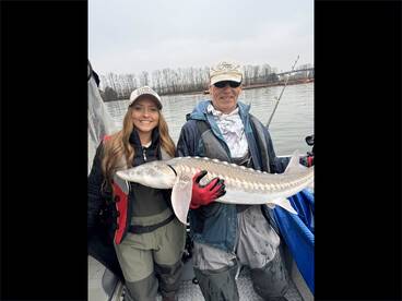 Brittney is all smiles with the fist fish.