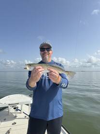 Trout,reds and a huge Bull shark