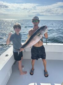 Captain Eddie and First Mate Mason for the WIN