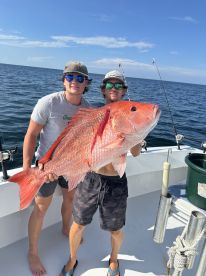 Captain Eddie and First Mate Mason for the WIN