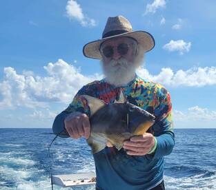 The captain and deckhand worked very hard at getting us a dorado.
