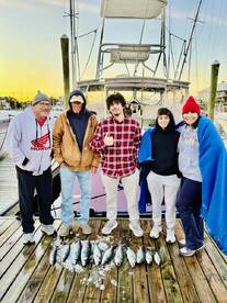 Raleigh family of four catch fishing bug