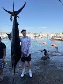 Most amazing fishing trip! Caught 265 lb blu marlin - over 9 ft long 
